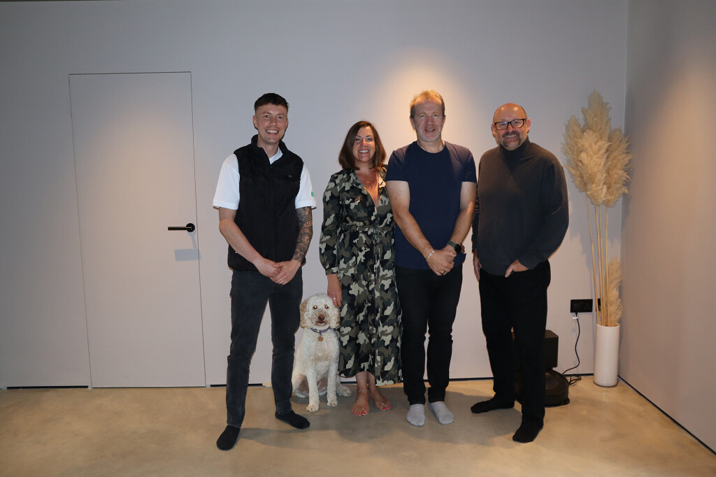 Rocket Door Frames' Callum (far left) and Jez (far right) with Sarah, Pete and their dog, Lexi